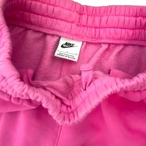 pink nike pants size L kids 30$